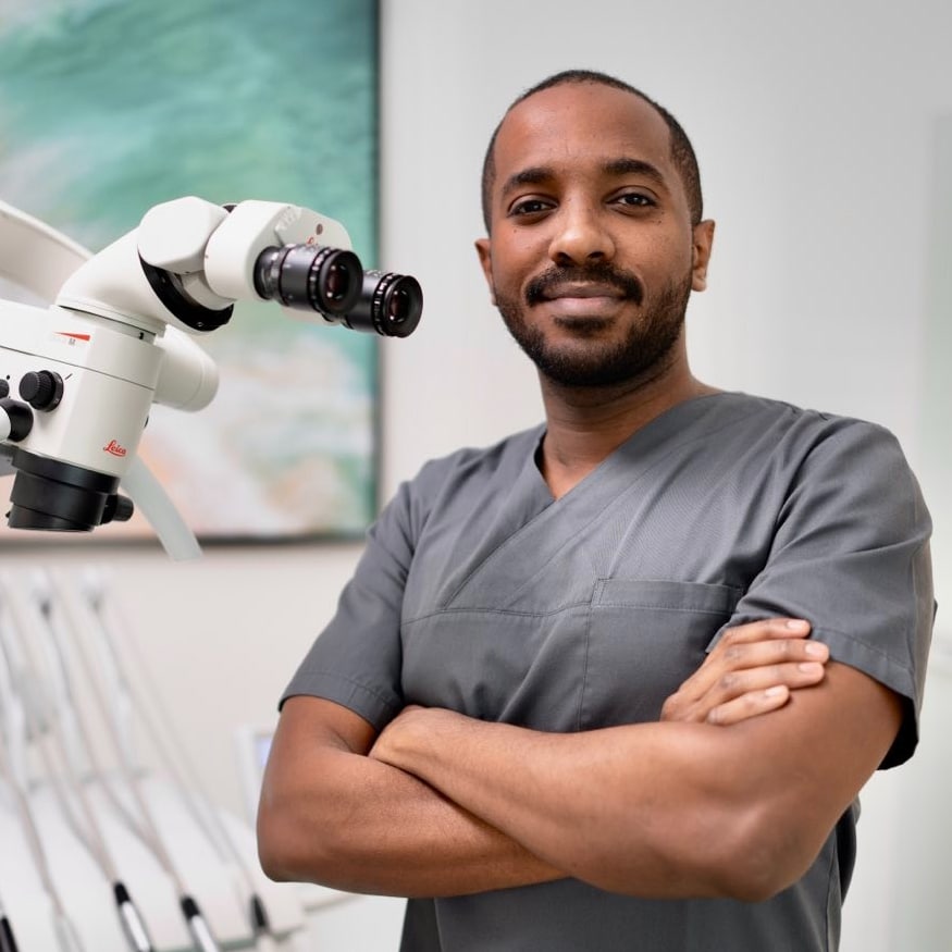 smiling male endodontist